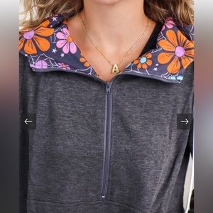 NWT Retro Blooms & Spidey Webs
Zip Up Hoodie. Woman’s size small